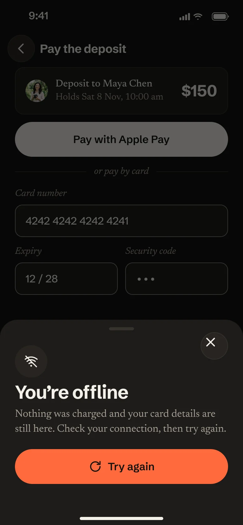 Offline: a sheet over the payment form says nothing was charged and the card details are still there, with a Try again button.